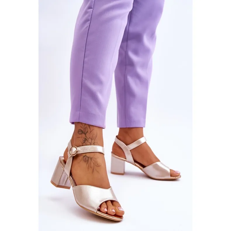 Comfortable leather Vinceza sandals on a golden Bellamy heel.