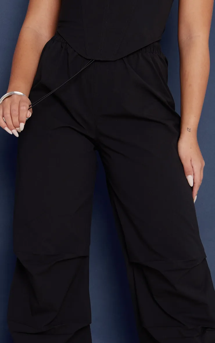 Pantalon cargo en nylon froncé noir à cordons ajustables